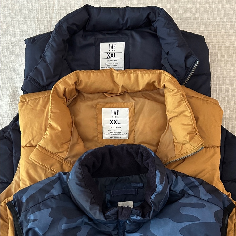 GAP Puffer Vests in Blue, Gold, and Navy camouflage